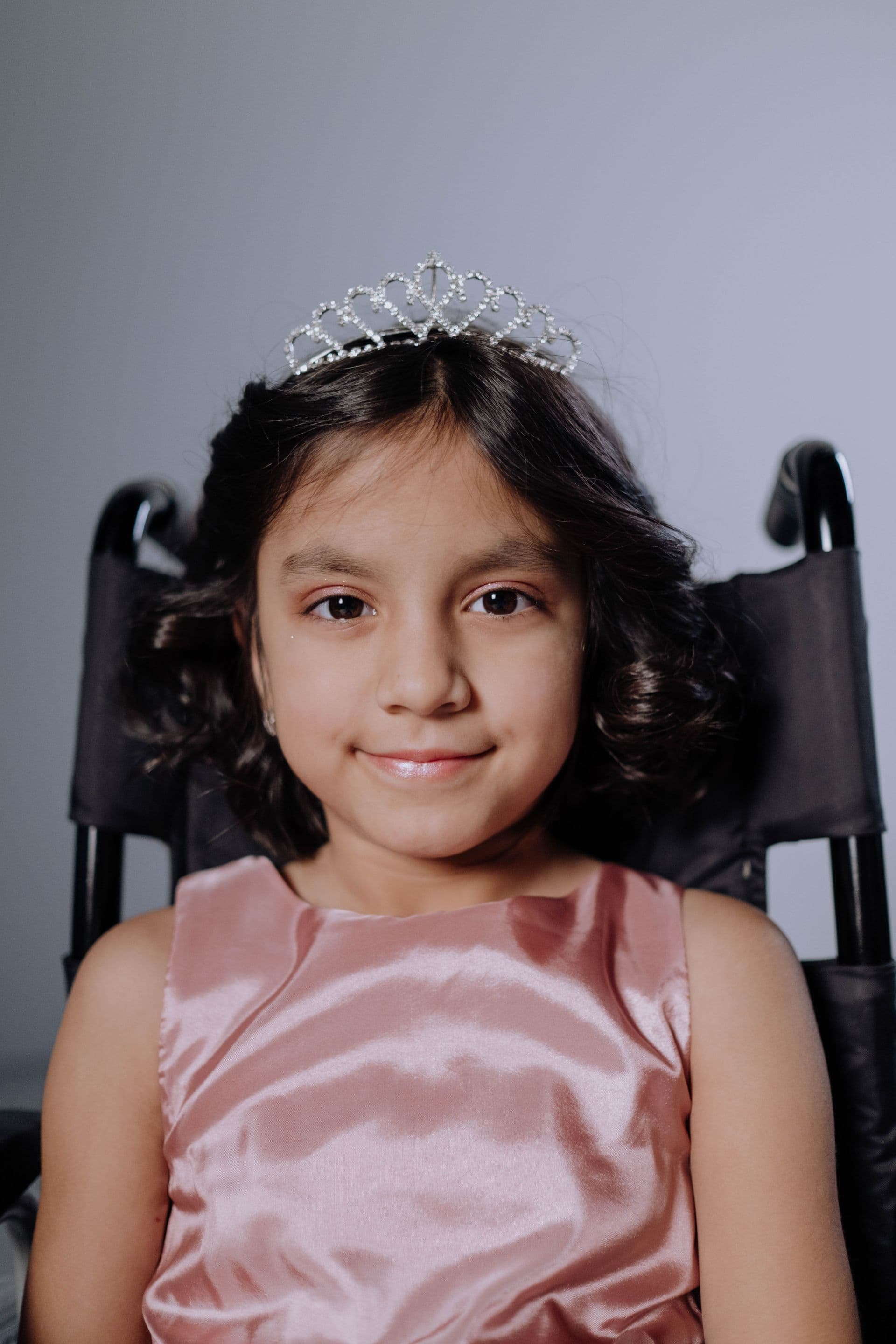A child smiling, part of the PlayKey community